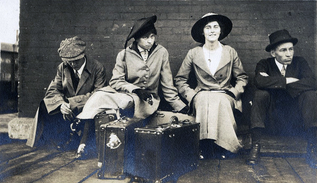St. Olaf College students waiting at the 1888 depot